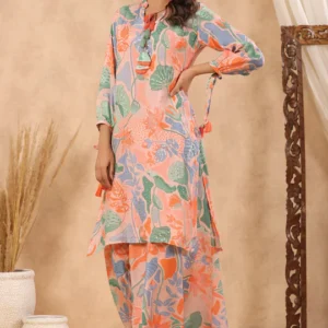 Multi coloured peach base abstract print kurta with palazzo set with pearl gota and sequins work