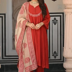 Rustic reddish mul chanderi suit set with beads and tari work on neck and block paisley with spread gota work dupatta